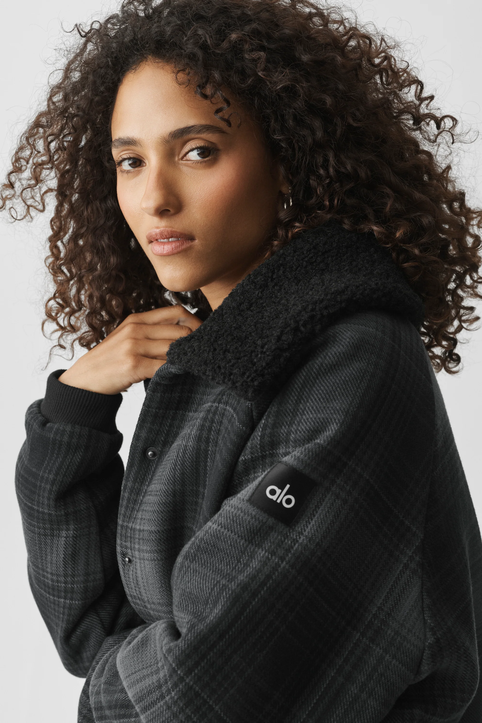 Plaid Alpine Meadow Jacket in Black Plaid by Alo Yoga
