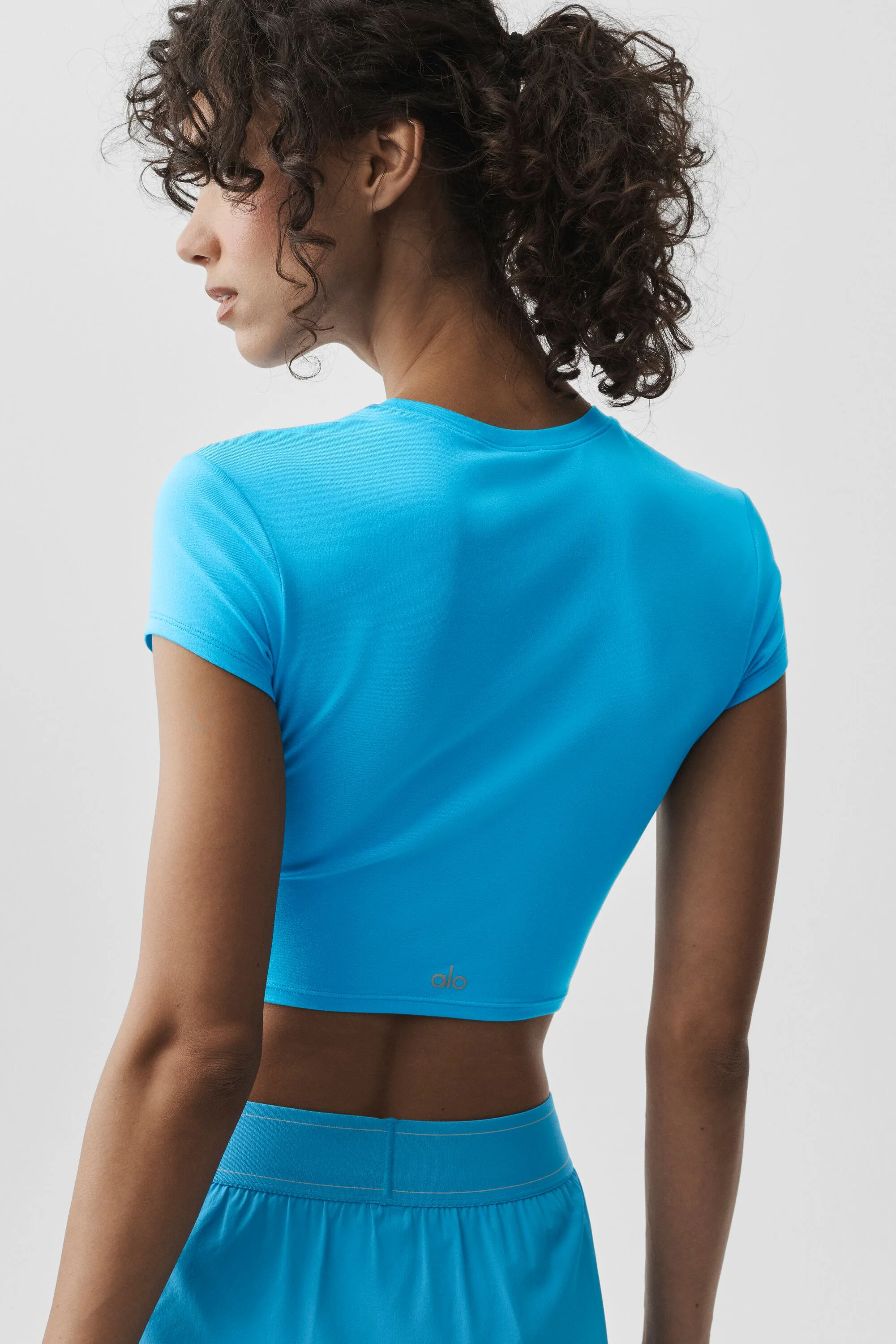 Alosoft Crop Finesse Short Sleeve Baby Tee in Azure Blue