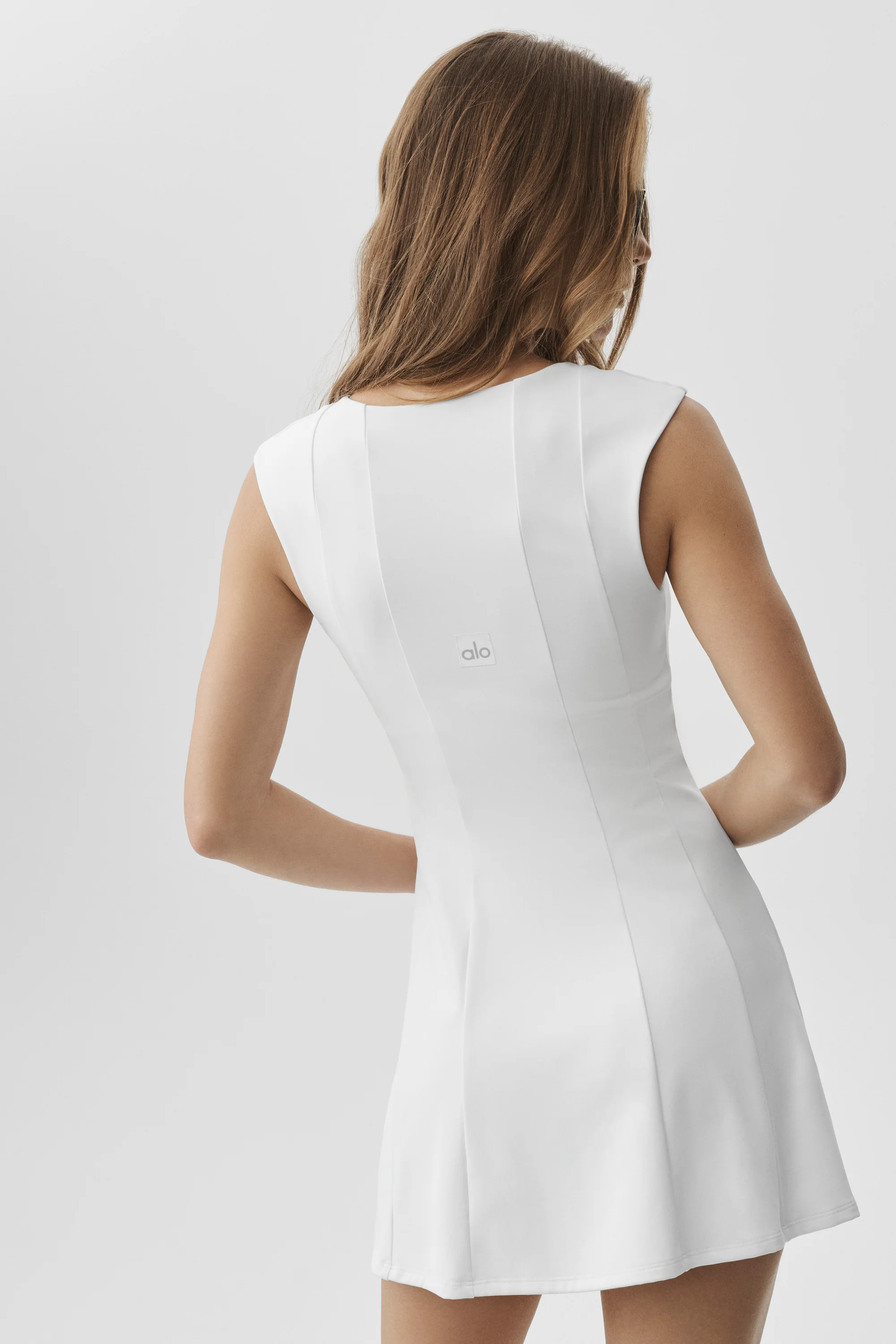 ALO Softsculpt Desire Tennis Dress in White with Cap Sleeves
