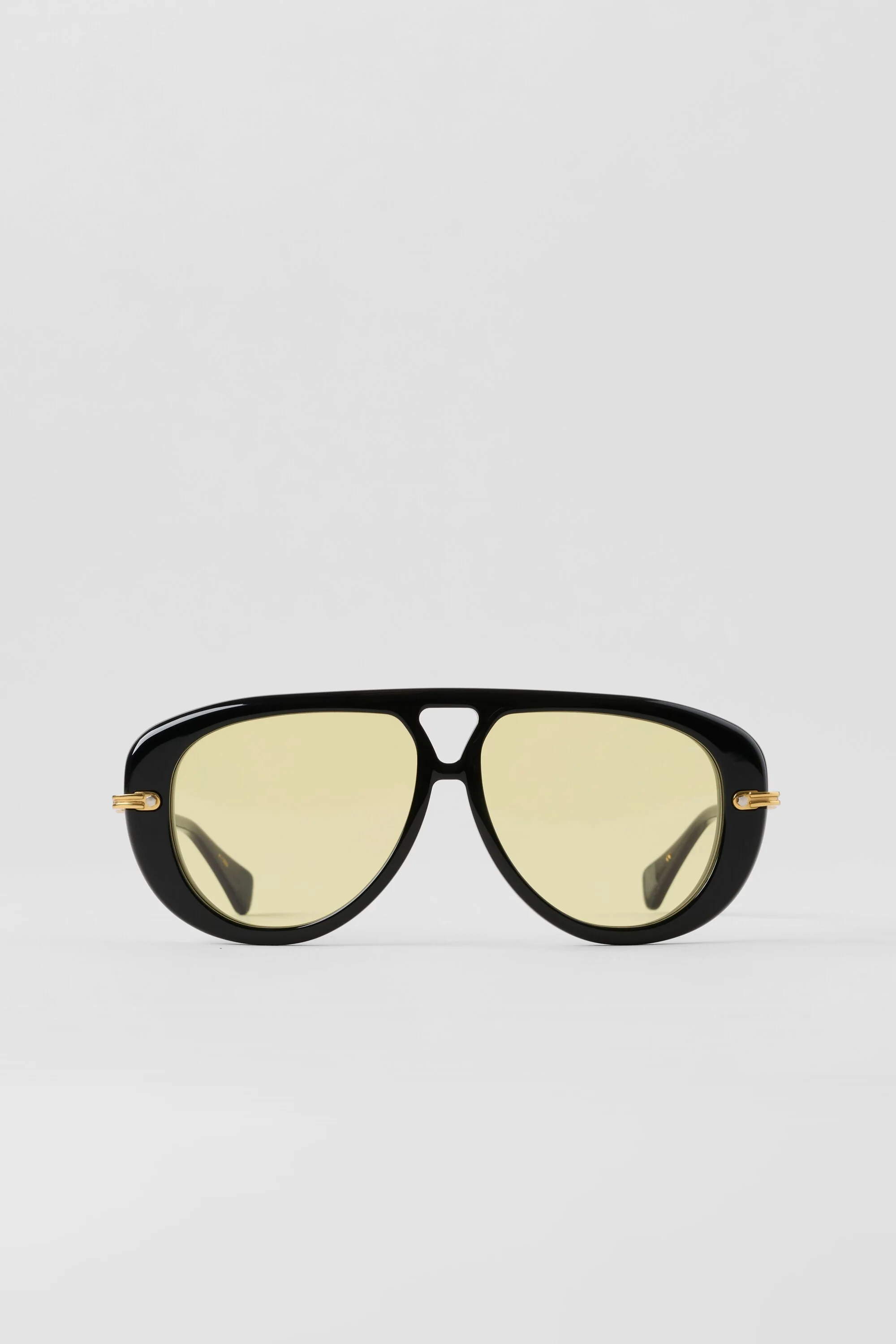 ALO Aviator-solbriller i sort med Yellow Amber-linser