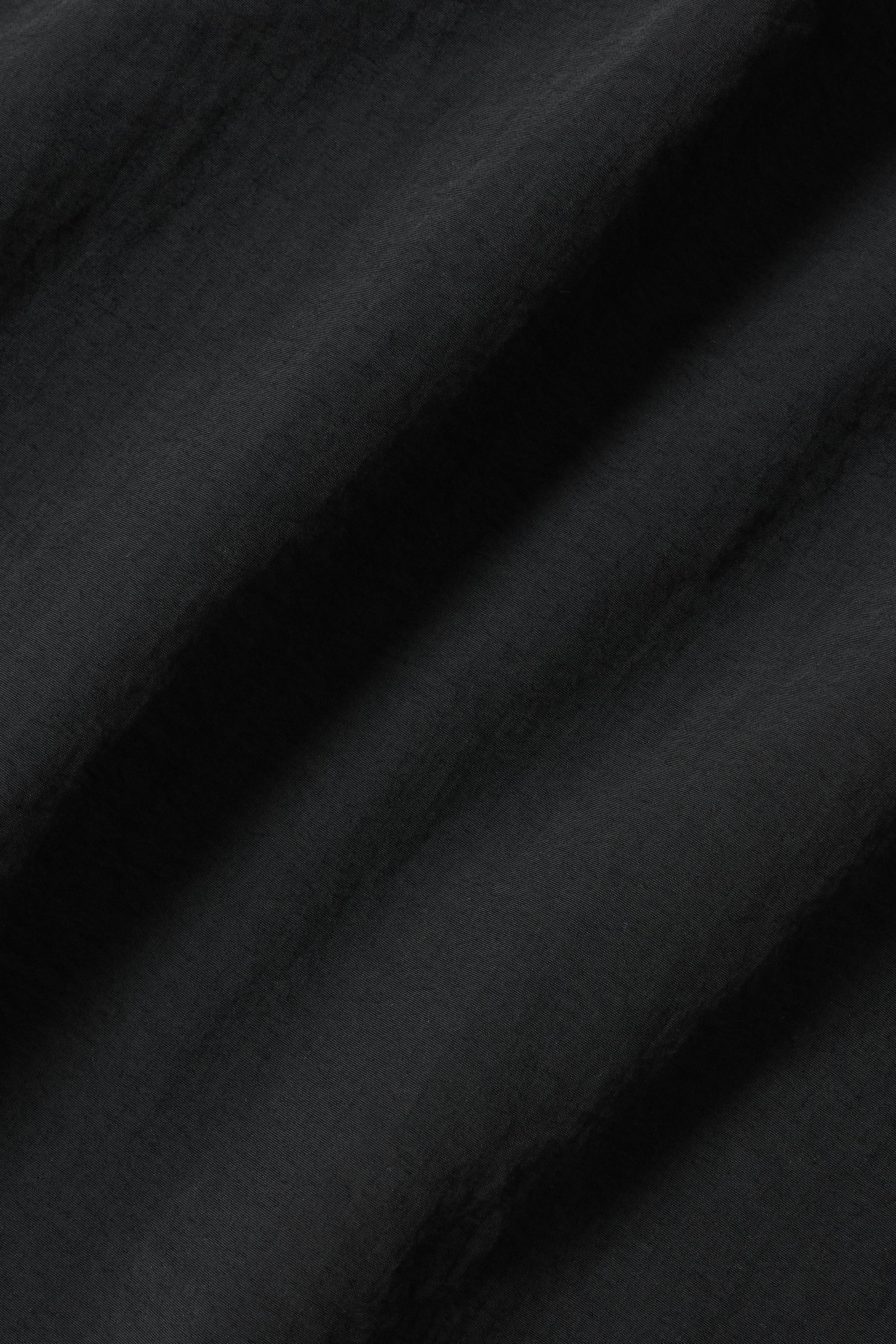 Duality Bomber Jacket in Black with Zippered Pockets