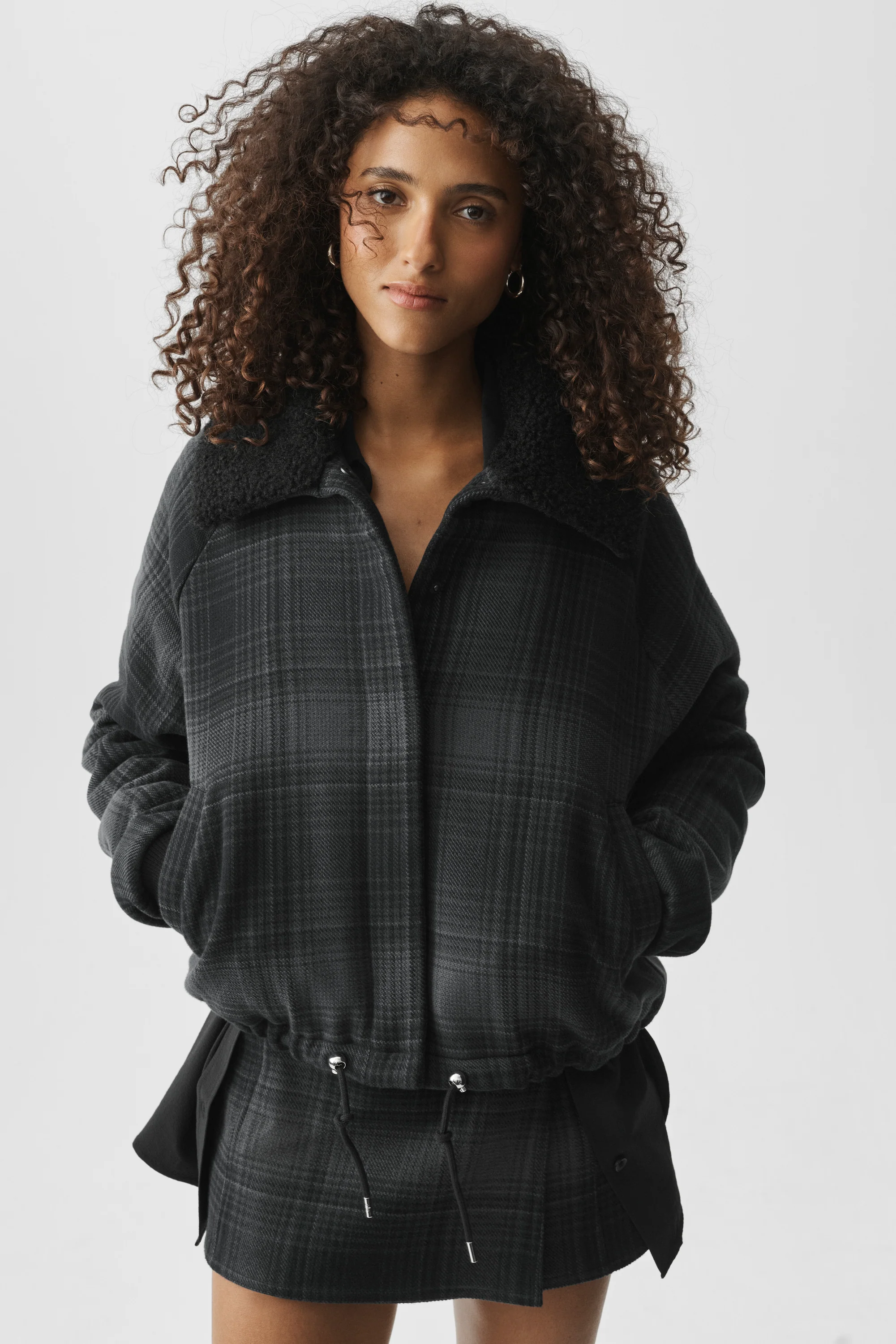 Plaid Alpine Meadow Jacket in Black Plaid by Alo Yoga