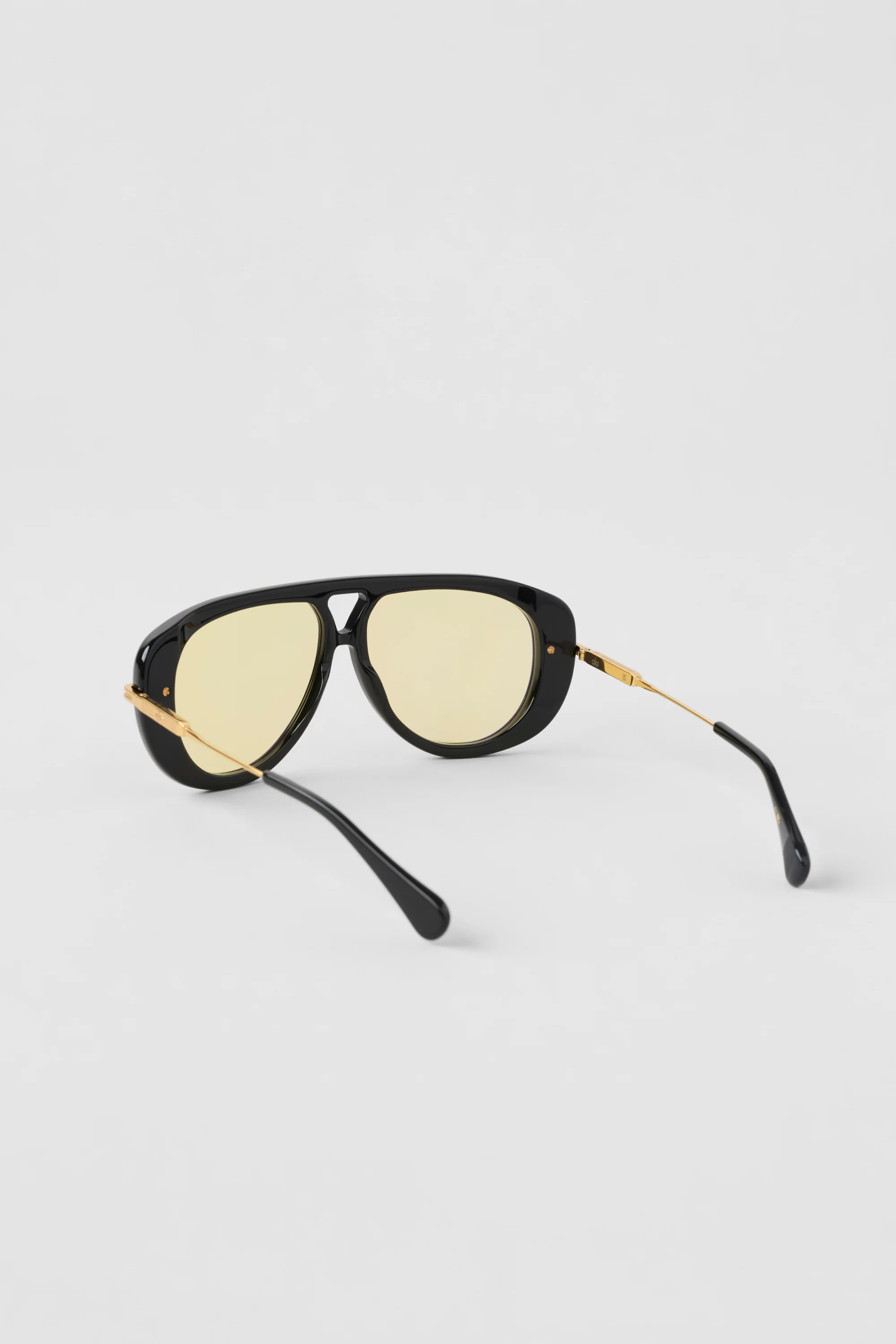ALO Aviator-solbriller i sort med Yellow Amber-linser
