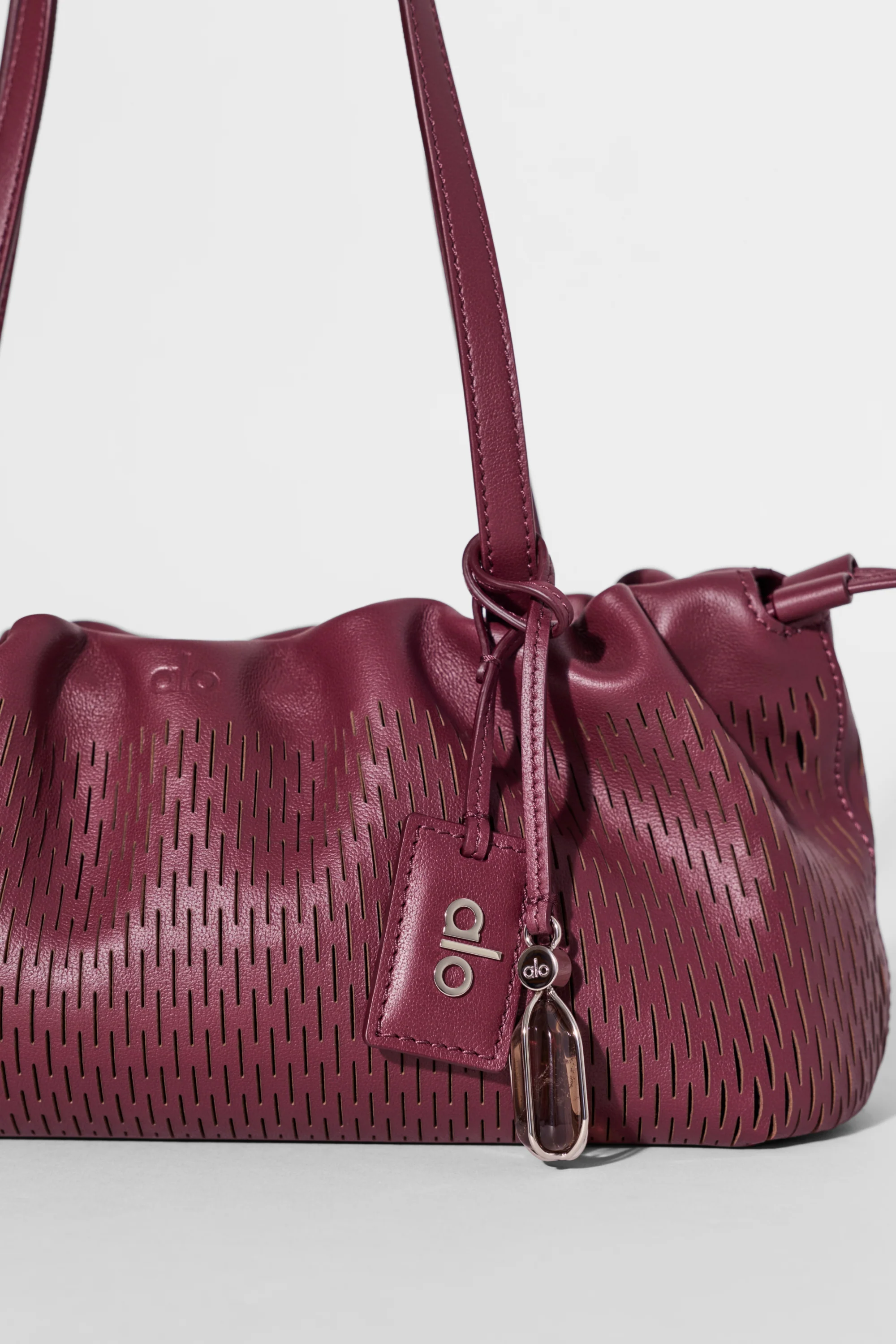 ALO Leather Mesh Mini Unwind Cinch Bag in Bordeaux