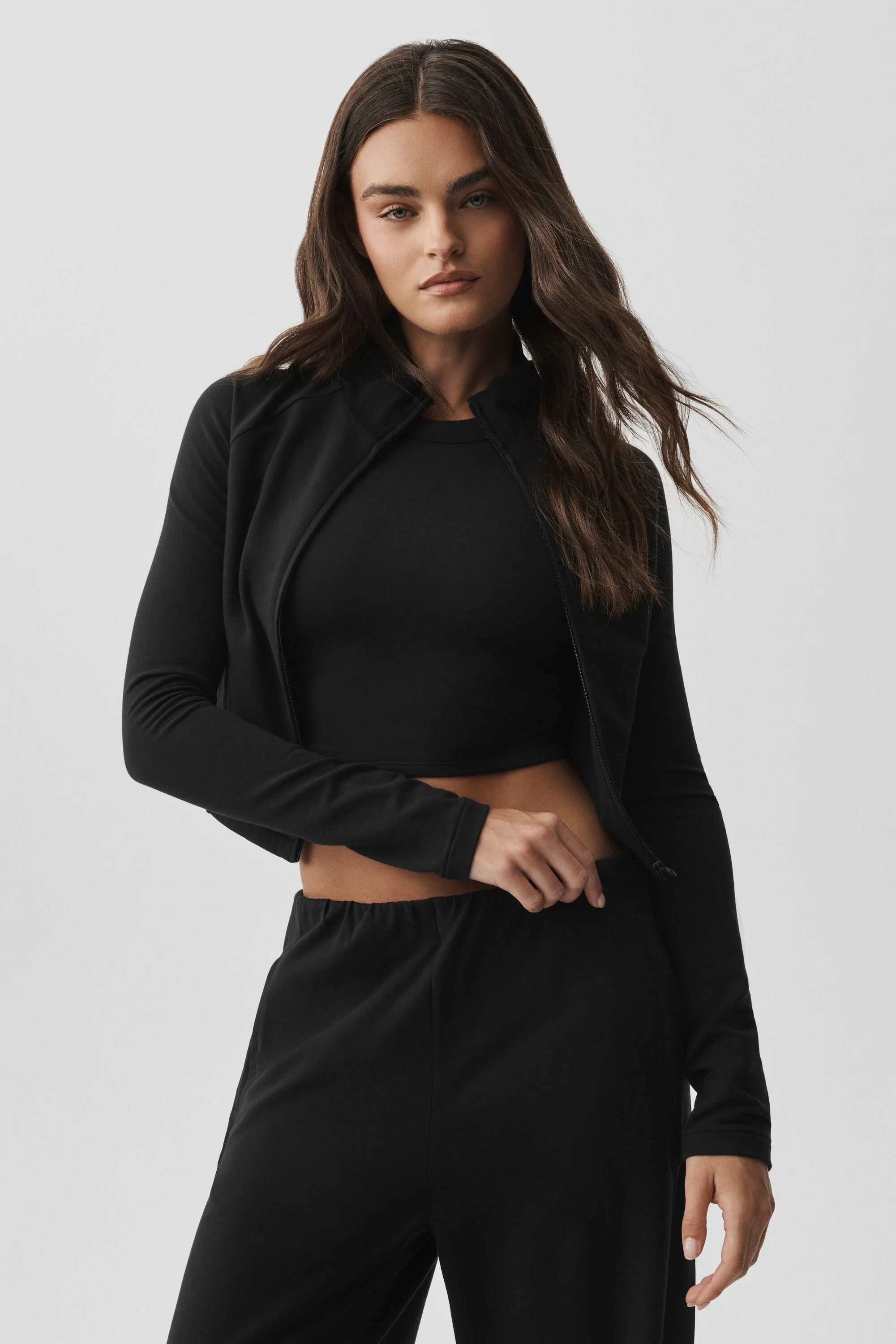 Sway On The Go Jacket in Black with High Neck and Zip Pockets