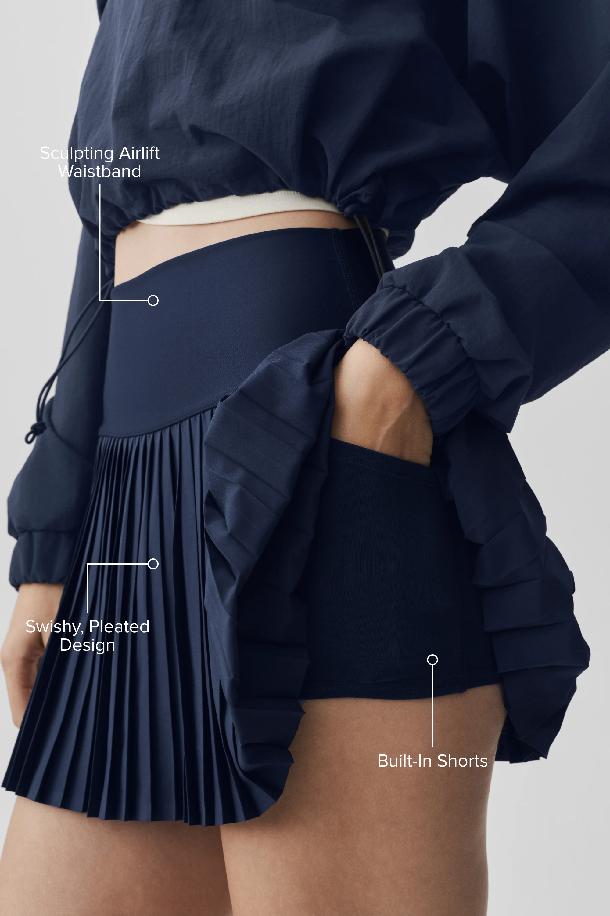 Serve Looks Tennis Skirt in Navy with Pleats and Built-In Shorts