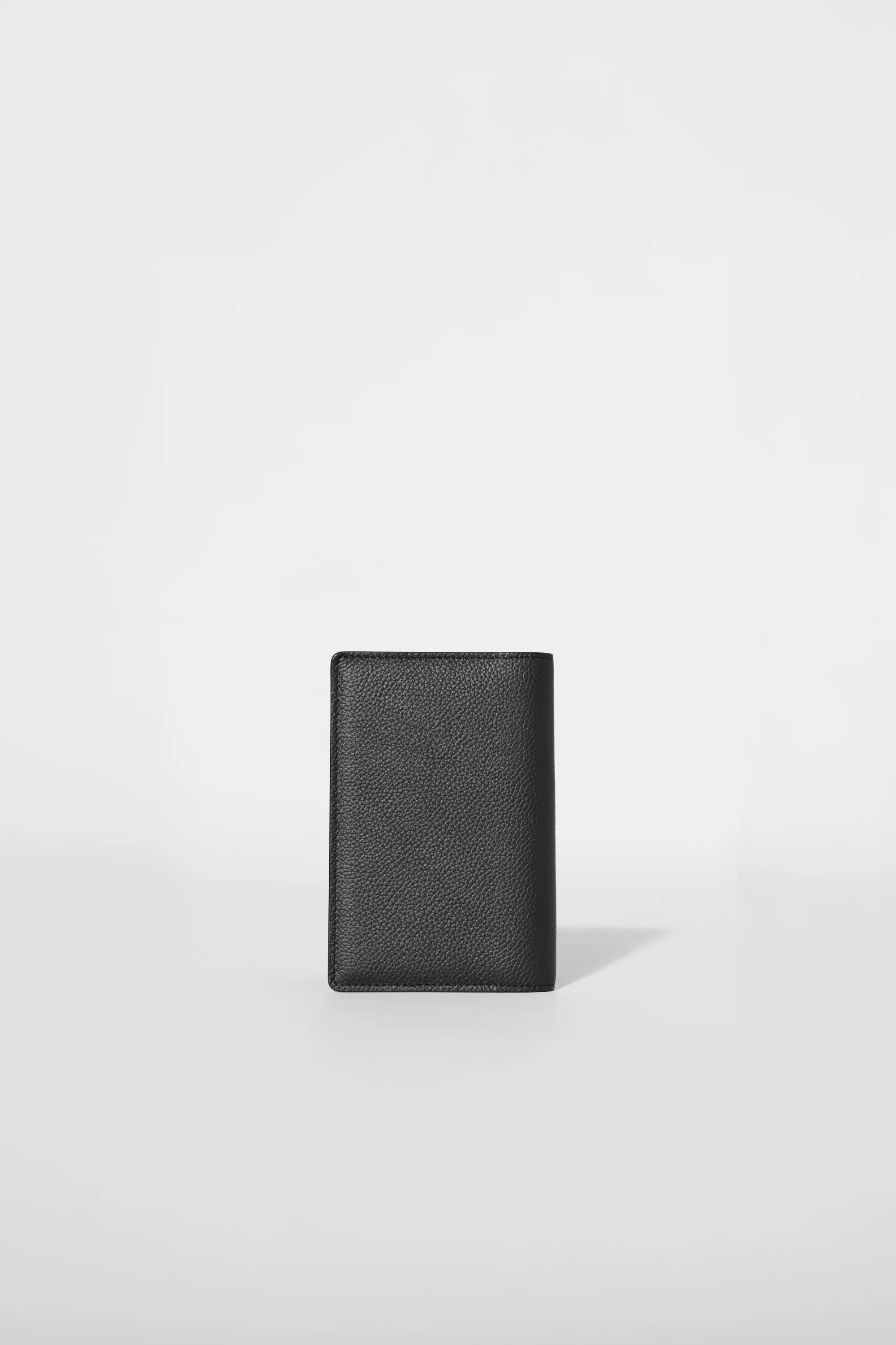 Passport Cover in Black Leather with Pockets for Cards and Tickets