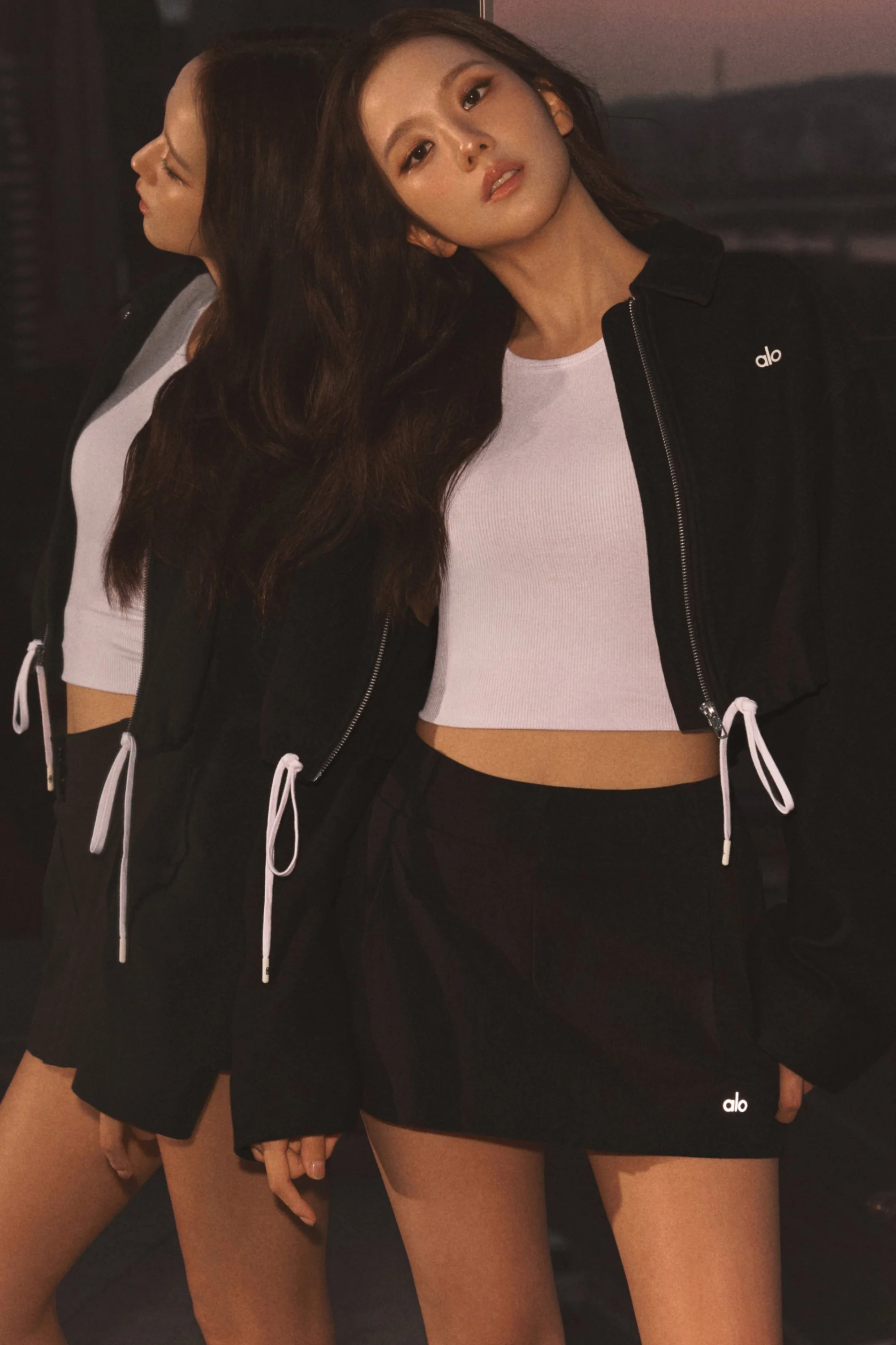 Minifalda Fan Club en Negro con Shorts Integrados y Pliegues Frontales