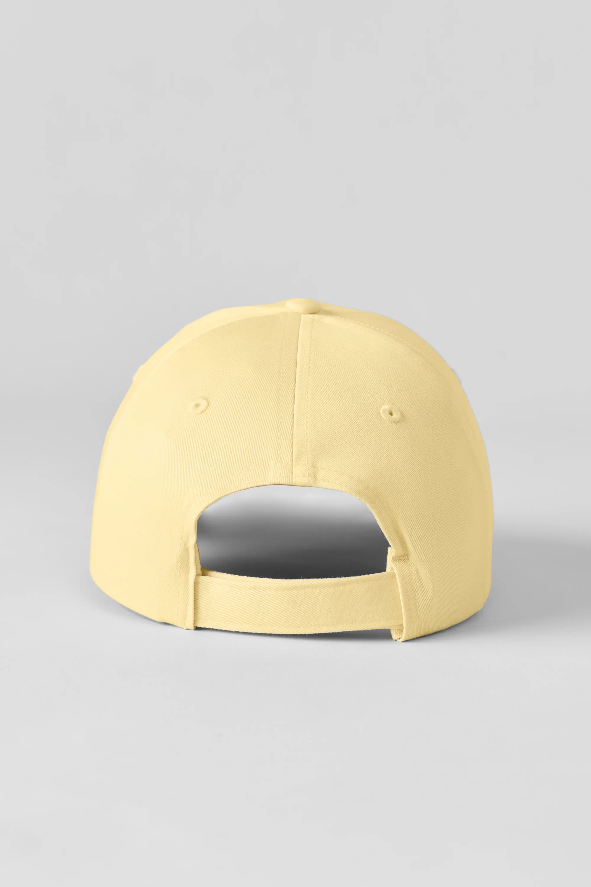 Czapka z daszkiem Off-Duty w kolorze Warm Butter z regulowanym paskiem na rzep